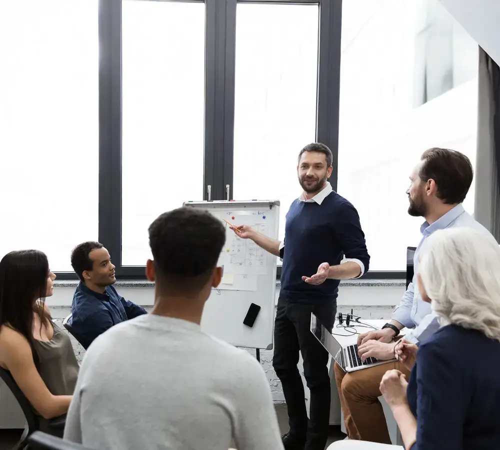 business-team-discussing-their-ideas-while-working-office-1